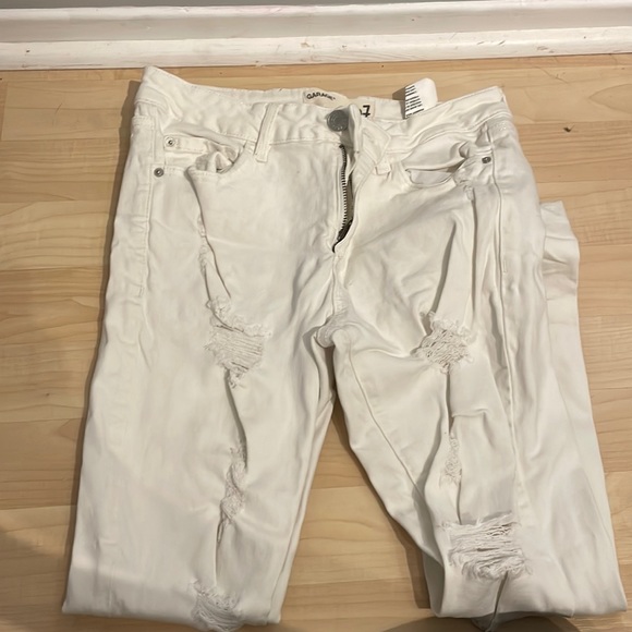 White jeans with holes